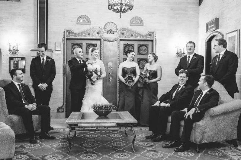 The couple with the bridesmaids and groomsmen