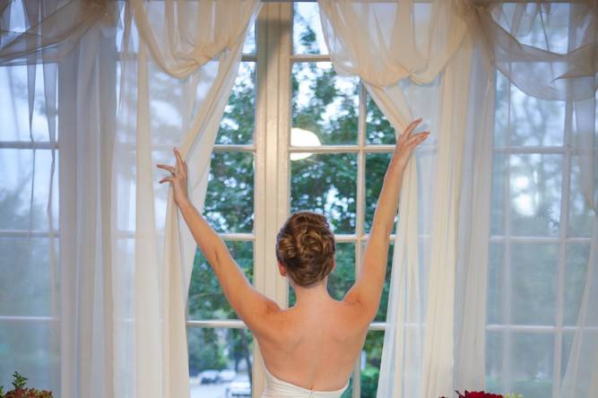 Bride by the windows