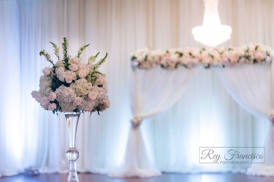 Gold stand with flowers