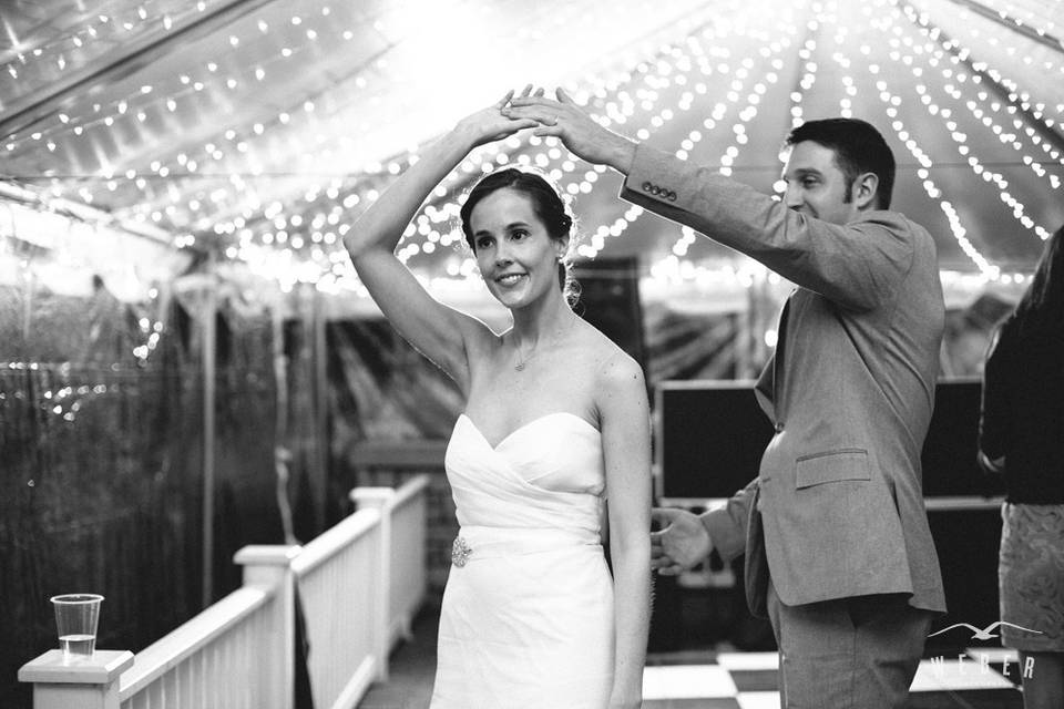 Couple dancing under fairy lights