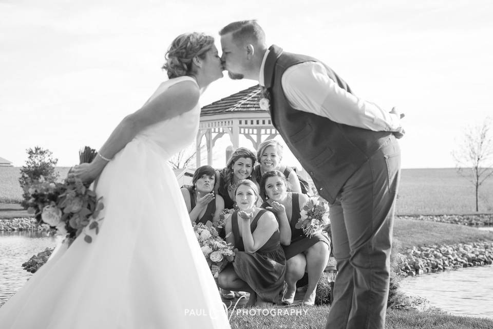 The couple and their guests black and white shot