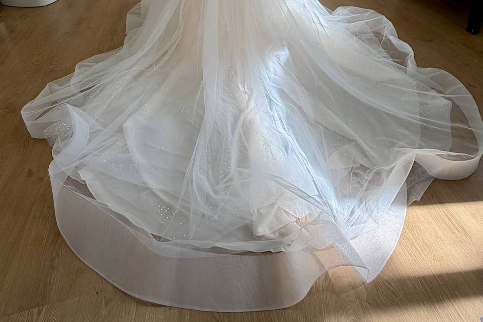 Ivory and Nude Wedding Gown with a long train worn by an actual customer (2).jpeg
