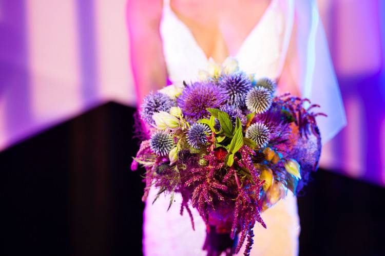 Lighting and effects by Stage Right Lighting. Bouquet by MISA Floral