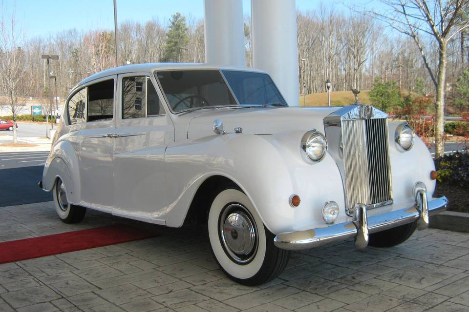 Our Amazing 1956 Bentley getting ready for the Bride and groom. The photo ops for the cars in your wedding are priceless. We are told that our bride and groom pictures are some of there favorite of the day.