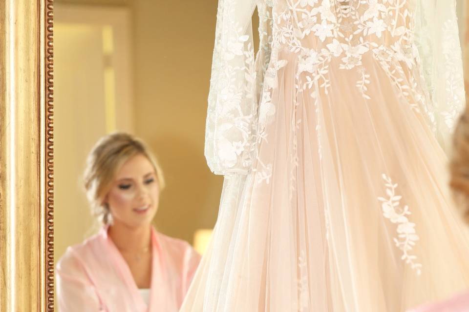 Bride looking at dress