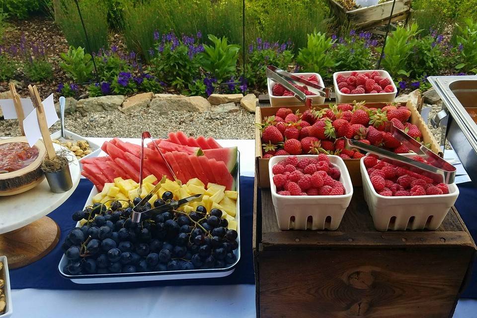 A fruit display on a buffet,