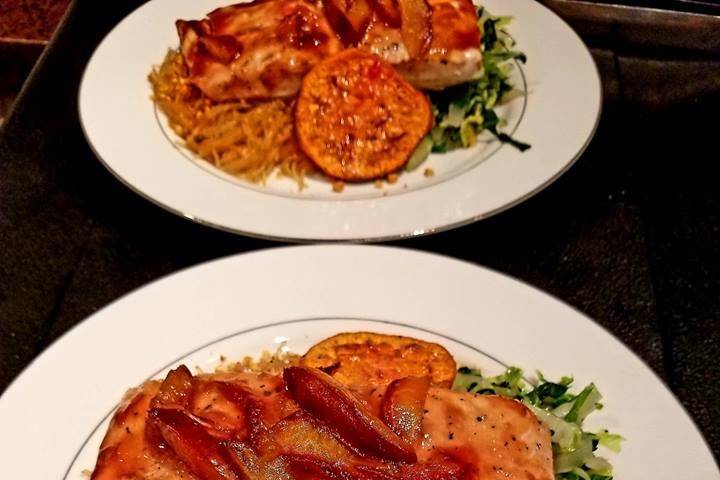 Hoisin plum salmon from our September menu on a bed of bok choy, glass noodles, and sweet potato medallions.