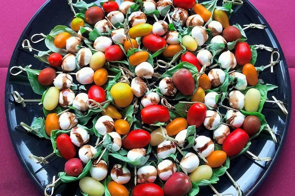 Beautiful tomatoes make these caprese skewers.