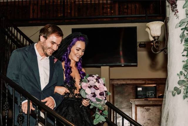 Bride and groom at staircase