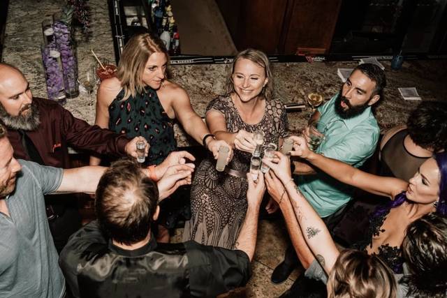 Couple and guests at bar