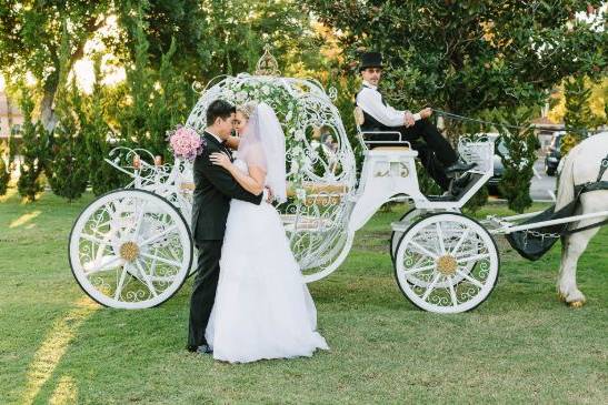 Couple and their bridal carriage
