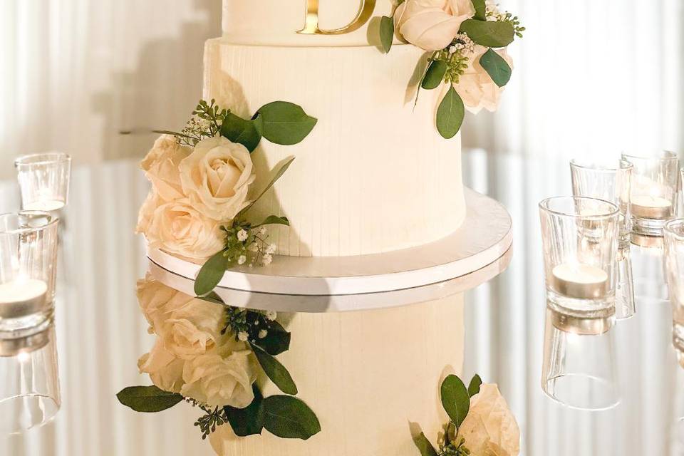 3 tier cake with gold acrylic