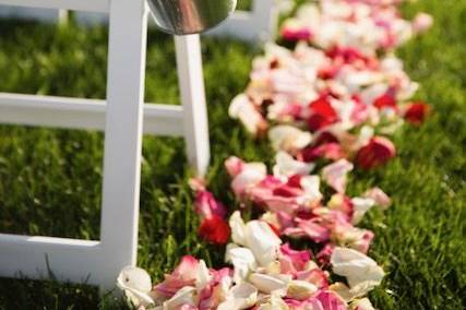 Petals on wedding aisle