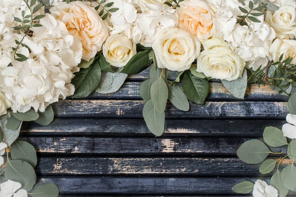 Floral-arrangement-beautiful-white-roses-wooden-background-concept-flowers.jpg