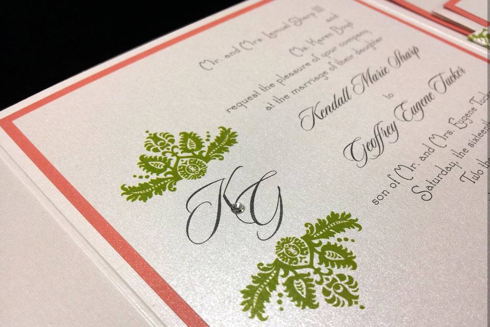 Kendall & Geoff - Envelopments pocket folder invitation with 2 layers inside.  Custom monogram with Swarovski crystal detail.