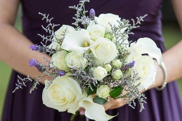 Purple dress against white roses