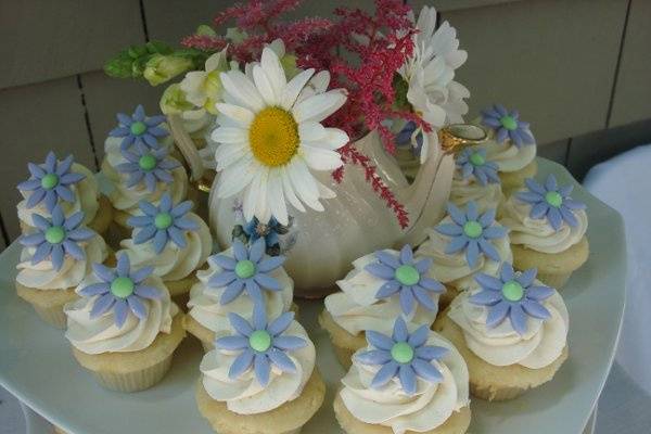 this cupcake is filled with spices and a silky cream frosting on top.