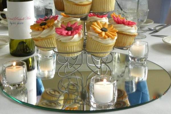 Vanilla Cupcakes with Vanilla Butter Cream~ fondant flowers courtesy of Nina Kelly cakes