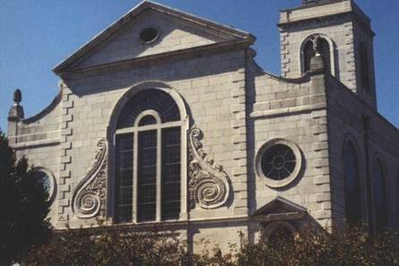 Picture of the Church of St. Mary, east side. You can see the intricate details and the stonework around the windows.