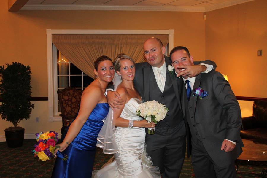 Couple with their bridal attendants