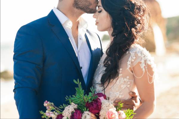 Newlyweds standing together