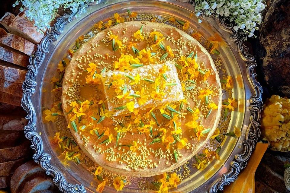 Gold leaf brie with honeycomb.