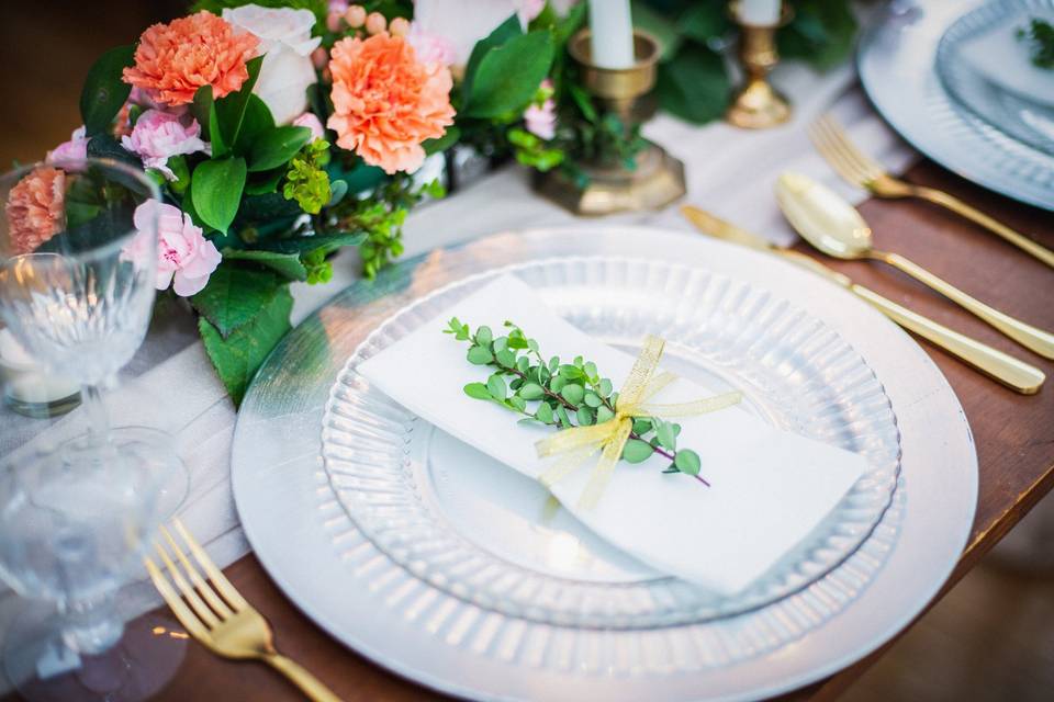 Reception table with plenty of greenery