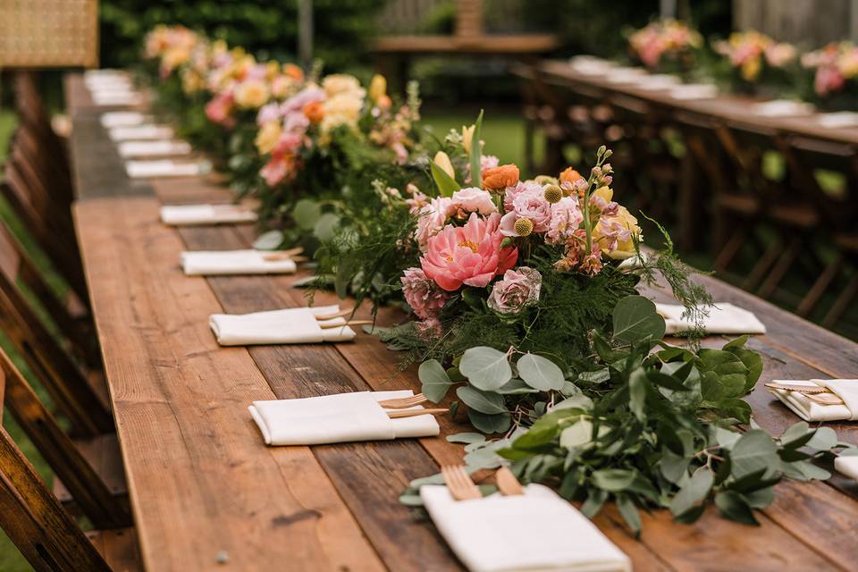 Long wooden table centerpiece