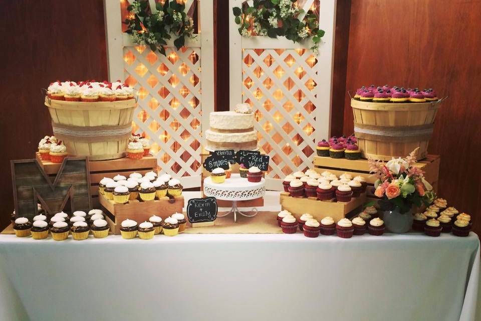 Wedding cake and cupcakes