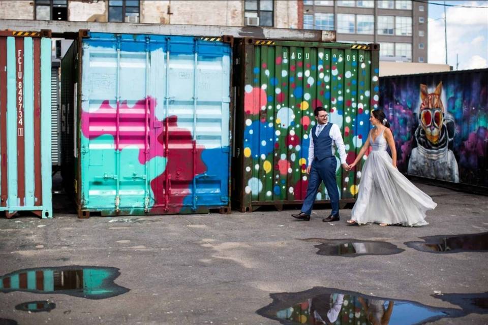 Newlyweds by the container vans