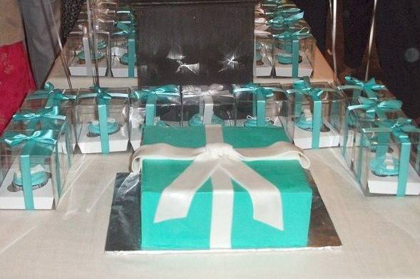 Breakfast at tiffany's themed bridal shower with individually wrapped cupcake favor boxes