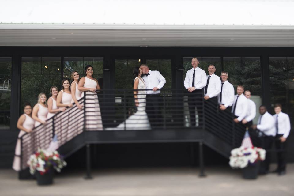 Newlyweds, bridesmaids, and groomsmen