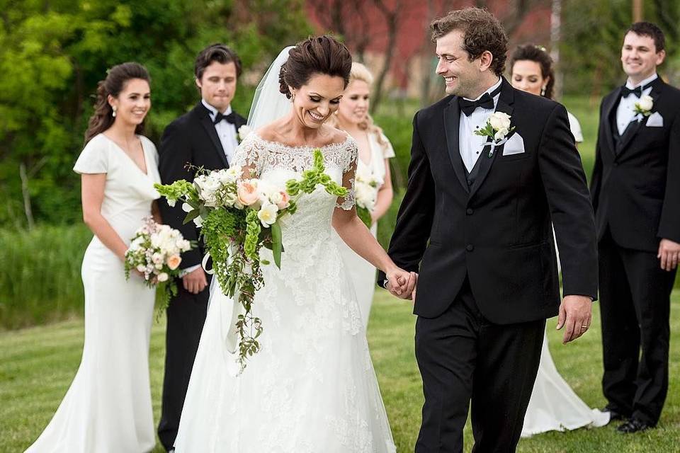 The couple with the bridesmaids and groomsmen