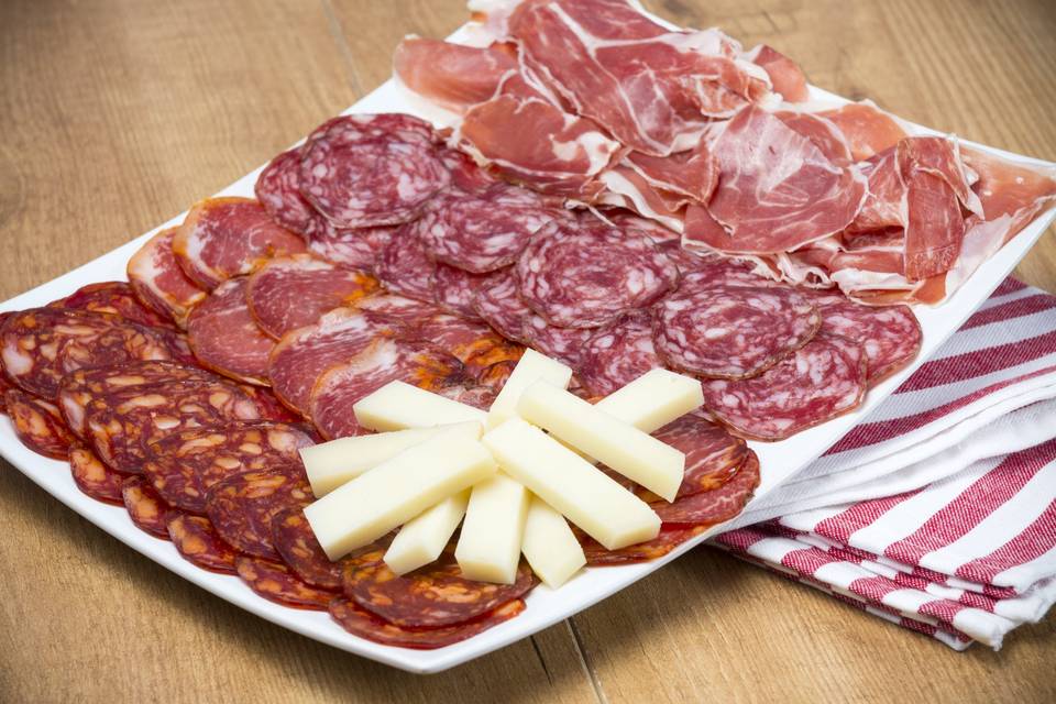 Assorted cured meats and cheese