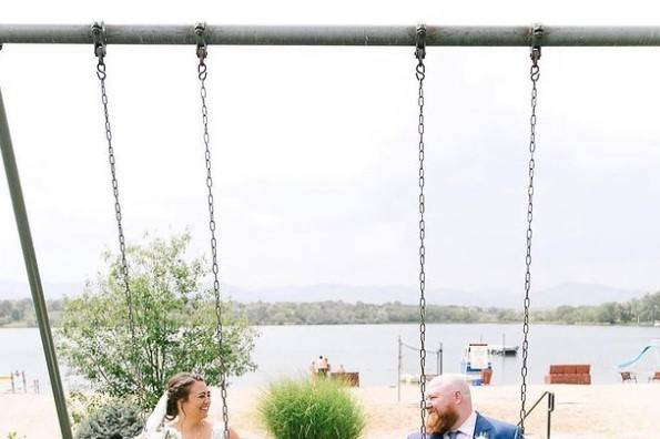 Couple on a swingset