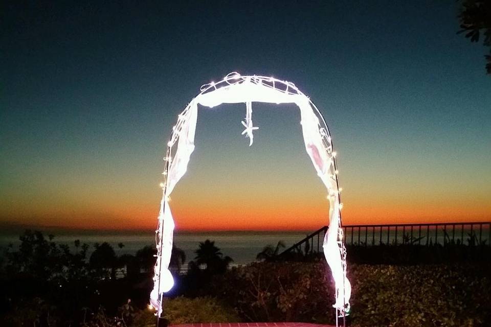 Arch for evening beach wedding