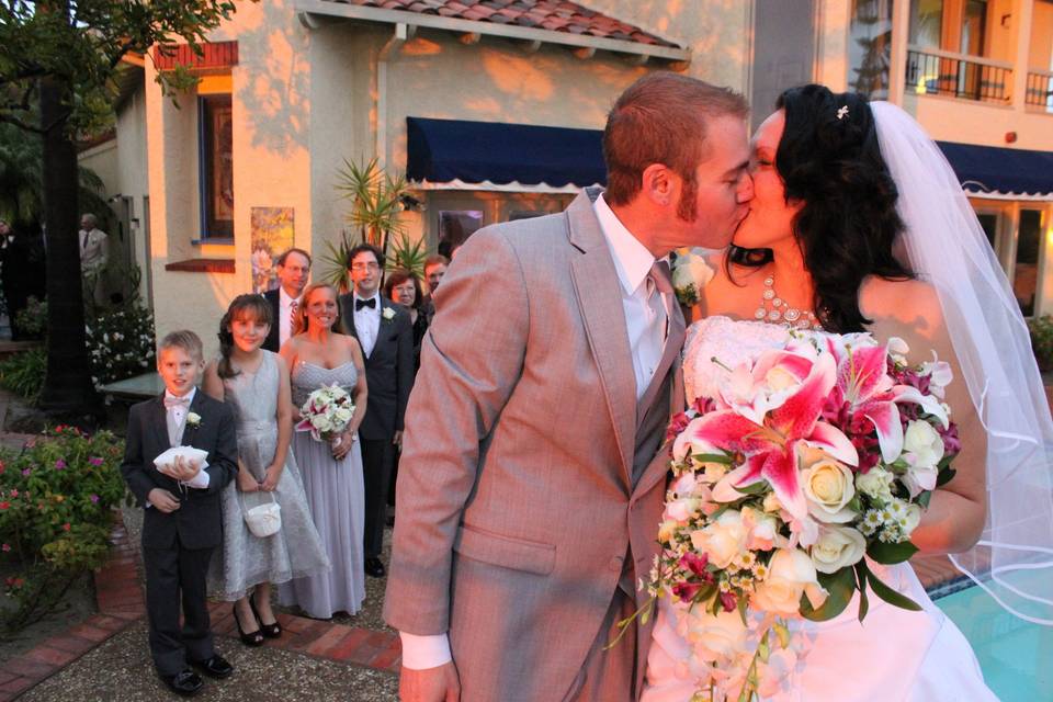 Bride and groom kiss