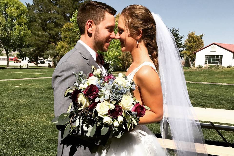 Bride and groom kiss