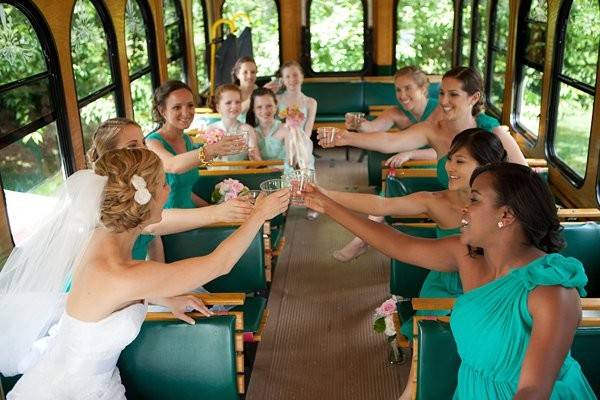 Bride and her bridesmaids inside a tram