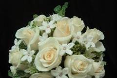 Roses and Stephanotis.  Very nice bouquet.