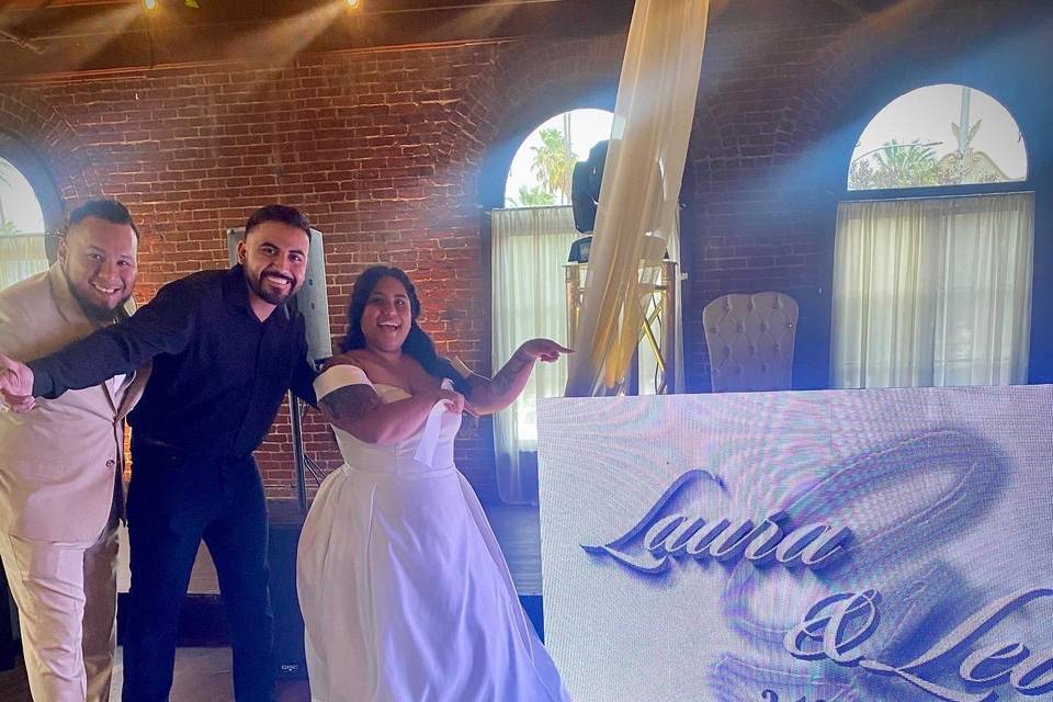 Couple with a custom sign