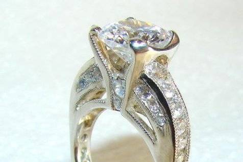 custom diamond engagement ring designed and created by Jjanusz