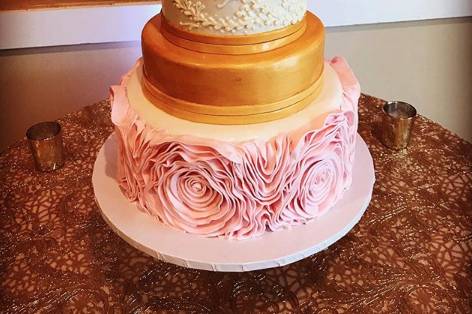 3-tier cake with gold and floral tiers