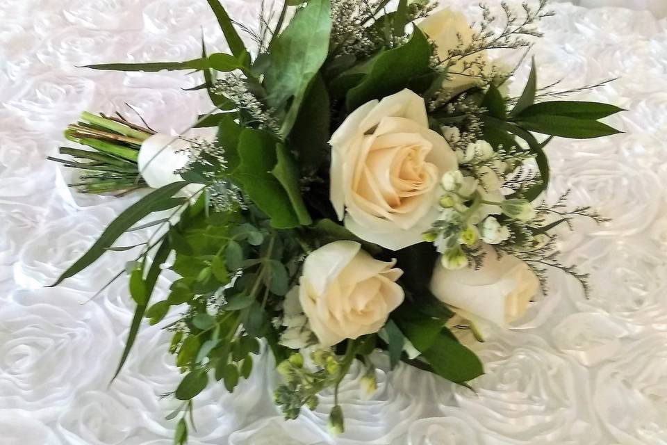Ivory roses and greens