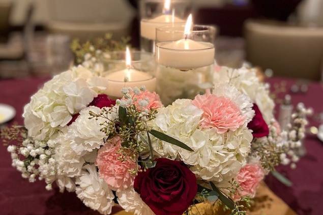 Candles and florals centerpiece