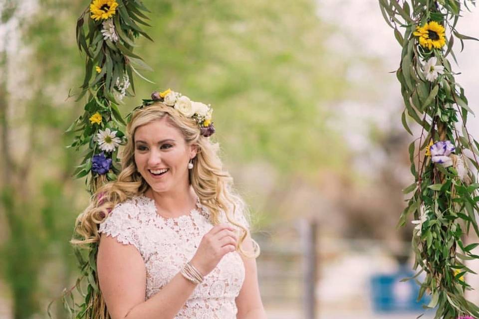 Elegant bride on floral swing