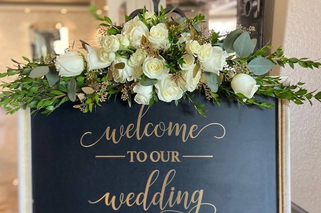 Reception sign flowers