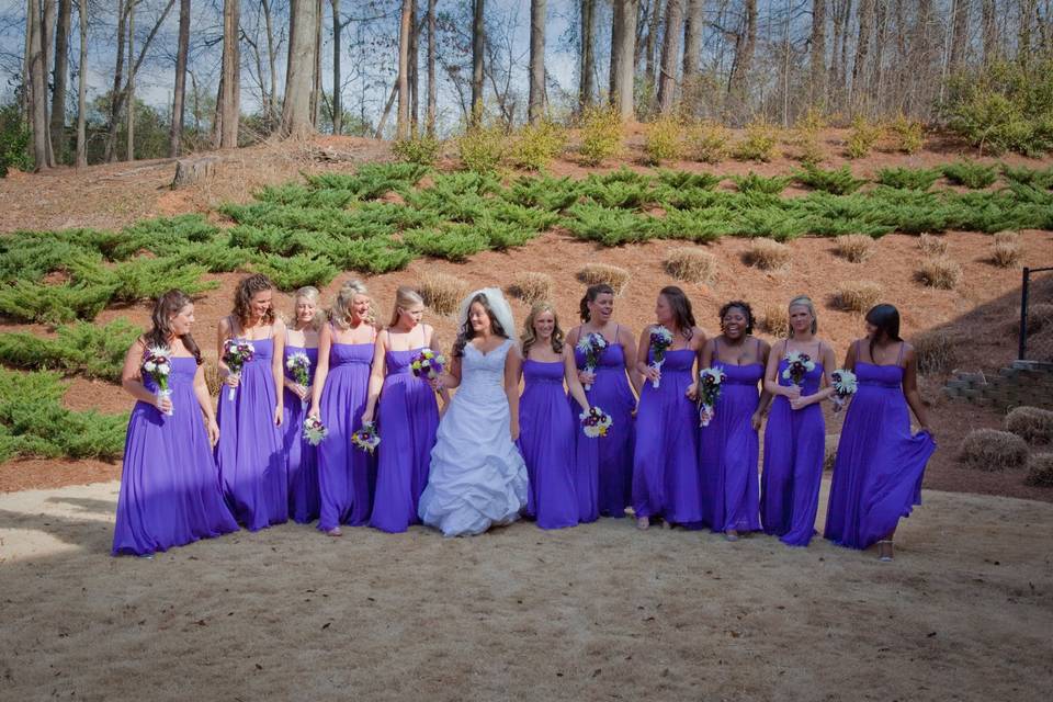 A bridal party in purple