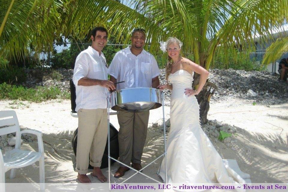 The bride and groom with the steel drummer--he was a true professional! Very friendly and played everything exactly as wanted by the couple.