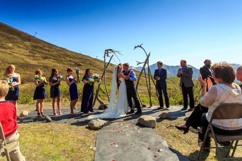 Ceremony on the lawn with beautiful background views